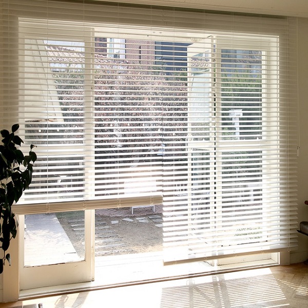 White wooden venetian blinds in a modern NZ living room